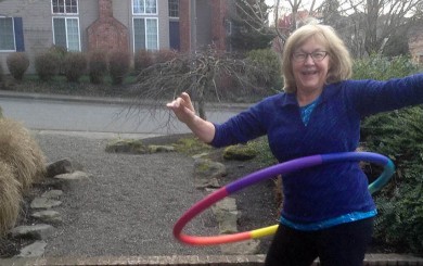 Image of a woman using a hola hoop