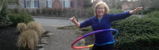 Image of a woman using a hola hoop