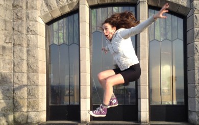 image of girl jumping using hip flexors
