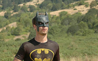 Image of a racer wearing a batman mask