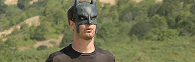 Image of a racer wearing a batman mask
