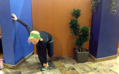 Laura Coleman demonstrating a single leg squat start position