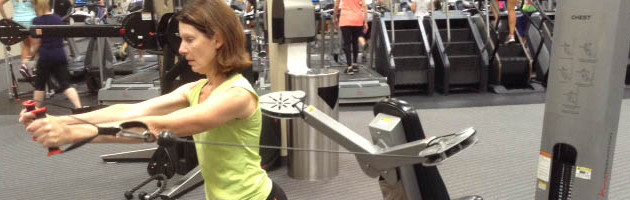 Image of woman doing a chest press