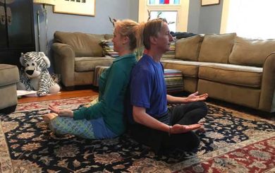 image of partner yoga with palms up