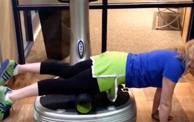 image of trainer Laura Coleman demonstration vibration training with a powerplate machine
