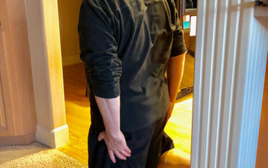 Image of a man doing a hamstring stretch exercise