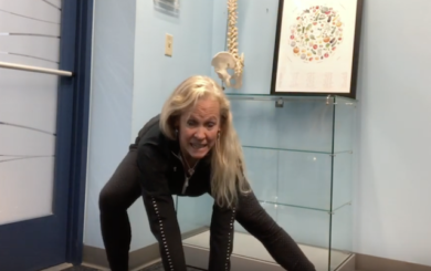 Image of trainer Laura Coleman Waite demonstrating an aductor stretch