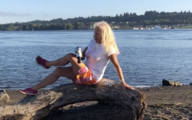 Image of trainer Laura Coleman Waite demonstrating how to use a fascia blaster tool